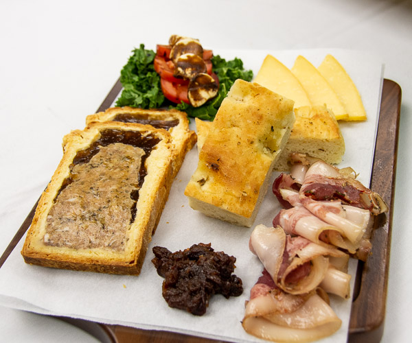 The third-place Advanced Garde Manger entry, an “Italian Pork” display with pate en croute, caprese salad, smoked Asiago cheese, focaccia, apple chutney, and seasoned, cooked and lightly smoked Porchetta di Testa.  The entry was produced by Nicholas M. Hanson, of Bernville, and Austin R. Phillips, of Hanover.