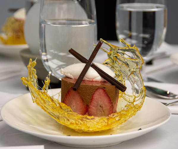 A chocolate mousse with strawberries, served in a caramel bowl, earns second place in the Classical and Specialty Dessert Presentation class. It was created by Ashley L. Geist, of Huntingdon.