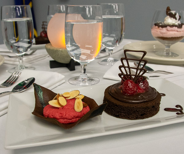 A dessert features chocolate and raspberries.