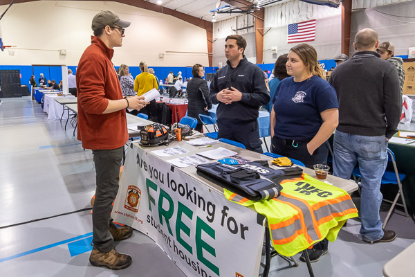 On-site accommodations are among the perks of joining a fire company, two of which recruited at this week's event. Loyalsock Volunteer Fire Co. members Nicholas D. Tartaglia, a residential construction technology and management: building construction technology concentration major from Doylestown, and 2019 emergency medical services alumna Alyssa M. Ogden talk with Sam T. Van Dermark, a manufacturing engineering technology student from Sayre. (The Old Lycoming Township Volunteer Fire Co. staffed a booth, as well.)