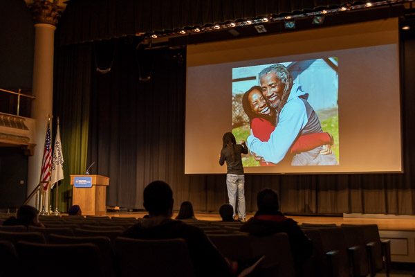Photos help the keynoter tell a family history.