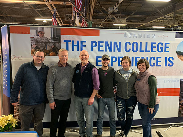 Among dignitaries stopping by the Farm Show booth was U.S. Rep. Frederick B. Keller (second from left), who joined in a group photo. From left are Williamsport City Councilman Adam J. Yoder, whose three Penn College degrees include a 2011 bachelor's in building automation technology; Philip G. Berry; Aaron J. Marsh, a concrete science technology major from Centerville; 2019 nursing alumna Danielle K. Rothra; and Sarah R. Yoder.