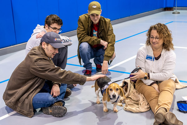 Lori E. Pepperman's multitasking beagle, Lillie, indulges student attention while keeping both eyes on the camera. Pepperman is a financial aid specialist for educational loan programs.
