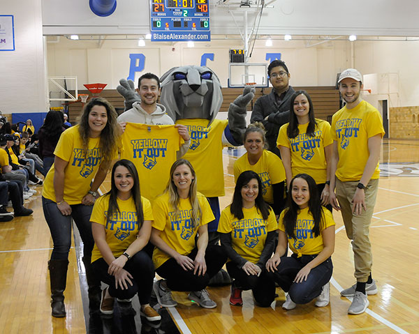 Sporting their support of a crucial cause, members of the Physician Assistant Club gather with the Wildcat.
