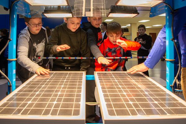 Feeling the heat! Guests discover the power of solar panels.