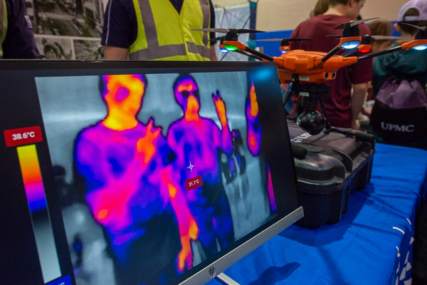 Peace out! Fifth-graders' thermal gestures are displayed on PPL Electrical Utilities’ magical monitor, which broadcasts the output from a drone’s infrared camera.