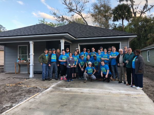 The Penn College group, with Clay County Habitat staff, executive board and volunteers