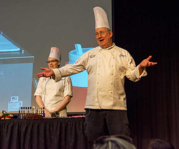 Suchwala, backed by baking and pastry arts student Jace A. Crowl, of Landenberg, engages the crowd.
