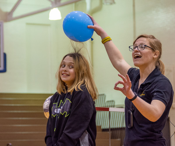 A Franklin Institute demonstrator starts off a lively lesson with a demonstration of static electricity.