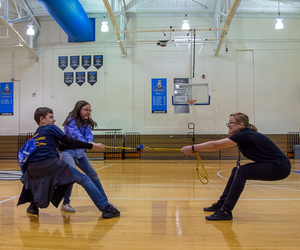 Audience members join the show to futilely try to separate two pieces of steel that moments before would not stick together. The difference? A battery was turned on to create electromagnetism.