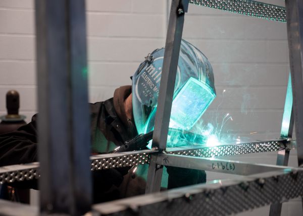 Colton and the other faculty and students employ MIG welding to get the job done. 