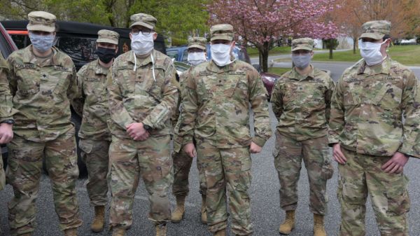 Pennsylvania College of Technology student Kristien Quintanilla (fifth from left} is part of a Joint Force Medical Strike Team deployed by Pennsylvania National Guard to assist at a rehab and nursing home in Delaware County. (Photo by Master Sgt. George Roach, courtesy of Pennsylvania National Guard.)