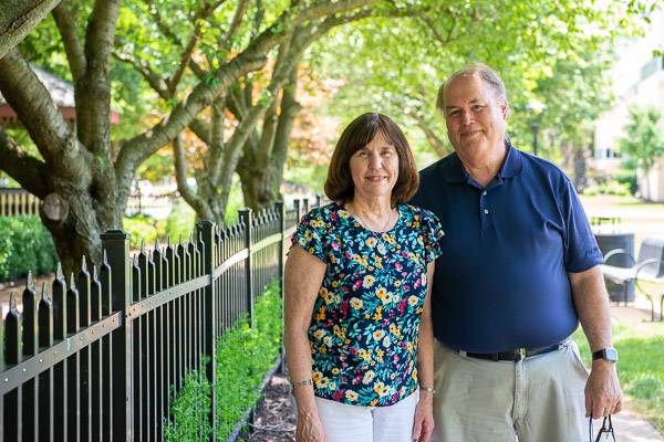 Barbara J. and Eric K. Albert pose outside The Victorian House en route to their Aug. 7 retirement. Director of the Dunham Children's Learning Center, she joined the Penn College family in October 1994; an associate professor of automated manufacturing and machining, he has been on faculty since August 1991.