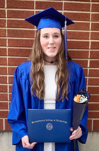 Russ, outside the Community Arts Center, where she accepted her associate degree in welding technology in May 2019.