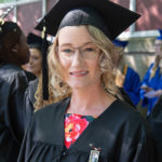 At the college's May 2019 commencement ceremony, Lisa M. Zimmer celebrates the culmination of her 12-year journey to a bachelor's degree in dental hygiene.