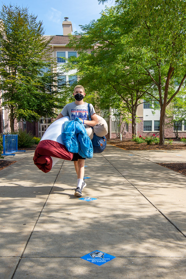 Seth J. Bradley follows the Wildcat's path, toting his comforter, pillow, etc. into York Hall. A Pottstown resident, he’s enrolled in landscape/horticulture technology: landscape emphasis. 