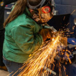 Barbara J. LeGeyt, a welding and fabrication engineering technology student, plies her craft in the makerspace.