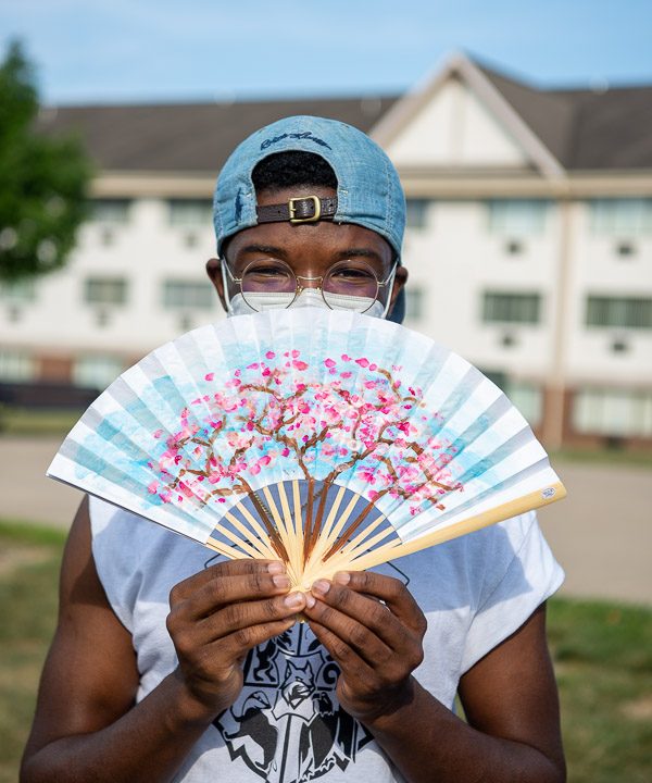 Matheu A. Davenport, an engineering design technology student from Lewisburg, chose cherry blossoms for his fan’s décor, a nod to celebrating Asian culture, he said. 