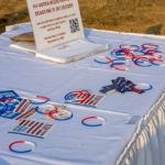 An information table feeds voter awareness and encourages signup by Pennsylvania's Oct. 19 deadline.