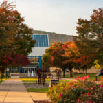 The southern hills are splattered by nature's paint job, as is the foliage that lines the campus mall.