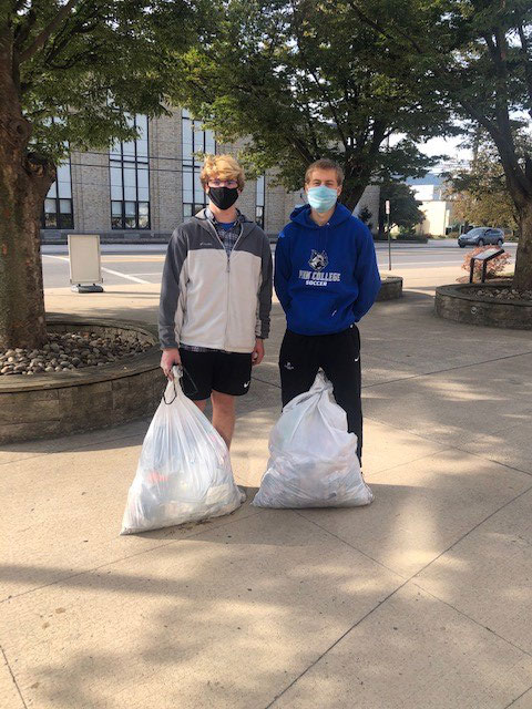 Wildcat soccer players Michael R. Dougherty (left) and Colton N. Wartman team up off the field, as well, gathering litter outside the Klump Academic Center. Dougherty, of Lancaster, and Wartman, of Ellicott City, Md., are enrolled in automotive technology management: automotive technology concentration.