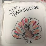 Capitol Eatery employees decorated the tops of the to-go boxes as they prepared to deliver Thanksgiving meals.