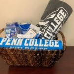 Items include gift baskets assembled and donated by the Wildcat Events Board ...