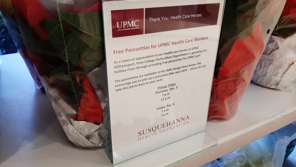 Tabletop signs acknowledge the college's contribution ... and the brave beneficiaries in UPMC's employ.