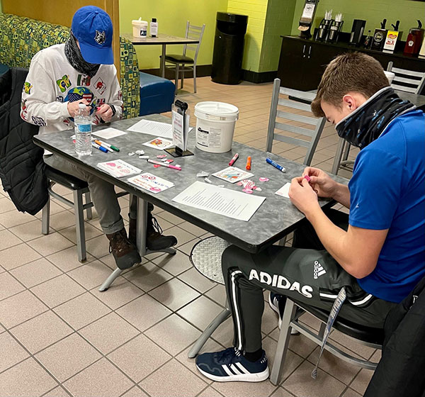 Soccer teammates Alexander S. Cassada (left), a network administration and engineering technology major from Chambersburg, and Braeden L. Eckard, an electrical construction student from Danville, focus on the task at hand.