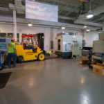 ... and its forklift delivery to the laboratory floor.