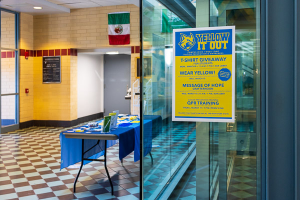 The week's schedule adorns the CC elevator, alongside one of the information tables placed around campus to spread the all-too-vital word that life-saving support is close at hand. 