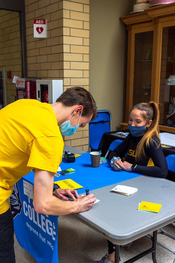 Student-athletes Alexander S. Cassada (soccer) and Hannah Burnett (volleyball) were on hand outside the Keystone Dining Room on Wednesday, collecting messages of hope at a 
