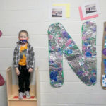 Also getting into the act are this member of the Birds' class, literally stepping up for the cause ...