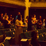 Returning to their seats, many of which were "out of play" to maintain appropriate distance, the inductees bask in the candlelit glow of achievement.