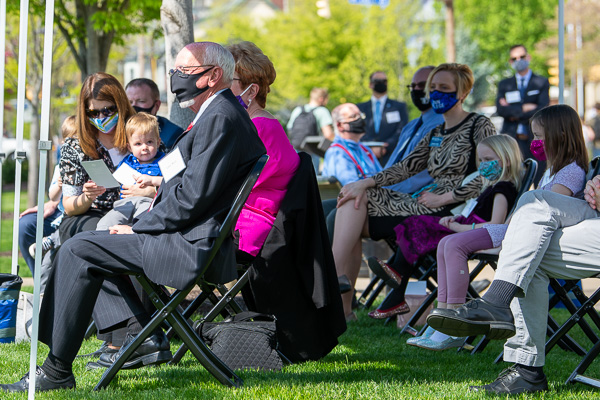Relatives gather under the tent, where even a young boy seems to sense his grandfather's colossal contribution. In the second row (in blue Penn College facemask) is Elizabeth A. Biddle, director of corporate relations, part of Ward's encouraging and appreciative Penn College family.