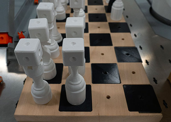 McGinley used a CNC router in the Dr. Welch Workshop: A Makerspace at Penn College to cut two chessboards out of basswood. He also designed and 3D printed plastic chess pieces, all measuring just over 4 inches in height.