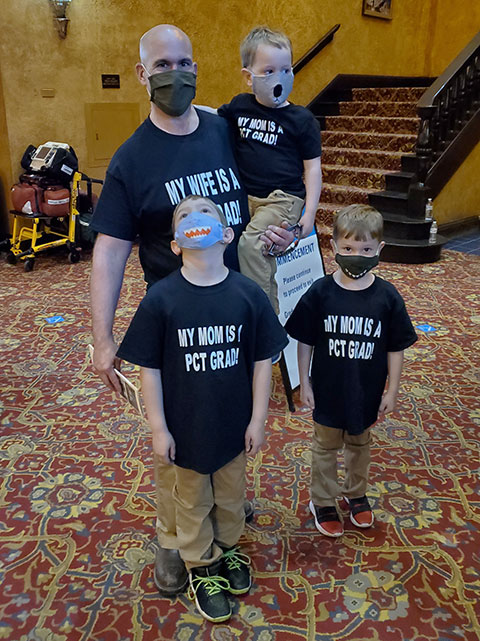 Brady Masteller and sons, of Troy, uniformly show support for their favorite graduate: Amber Masteller, who earned an associate degree in nursing. (Photo by Elliott Strickland, vice president for student affairs)