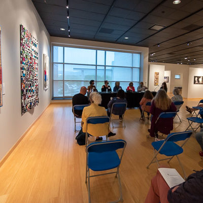 Attentive attendees and artists at the first public event in the gallery since January 2020