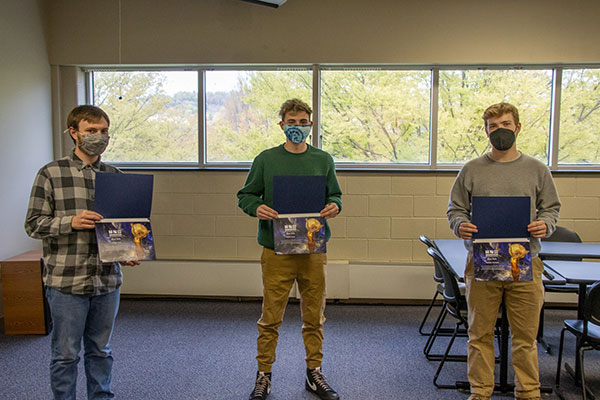 Among 27 Pennsylvania College of Technology students who received Innovation Engineering Blue Belt certification through the Innovation Engineering Institute, part of the Eureka! Ranch, are (from left): Andrew J. Goth, an industrial design student from Emmaus; Nolan M. Hickok, an industrial design student from Troy; and Harrison Wohlfarth, of Midlothian, Va., who earned a degree in building construction technology and is pursuing degrees in concrete science technology and applied technology studies.