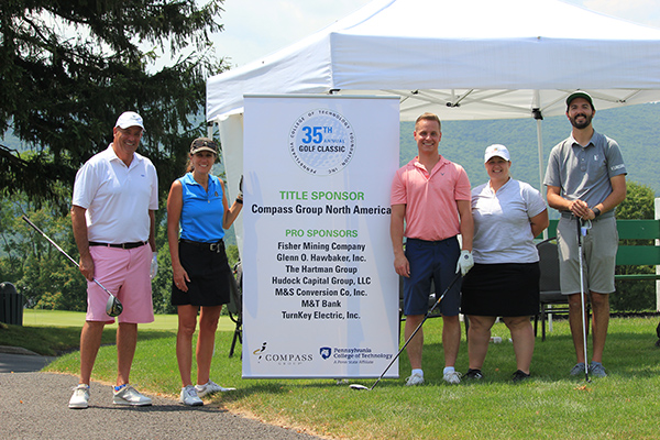 Compass Group North America, the Title Sponsor, celebrates with its 