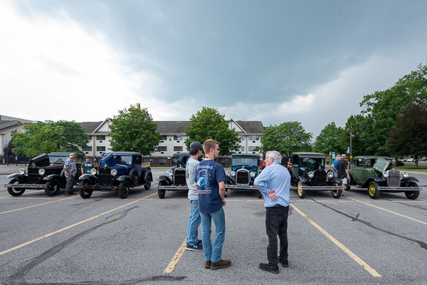 A lineup of six Model A vehicles rolled onto campus to the delight of the Automotive Restoration Pre-College Program. Members of the local Model A Restorers Club regularly visit campus to share their wisdom (and their wheels) with youngsters.