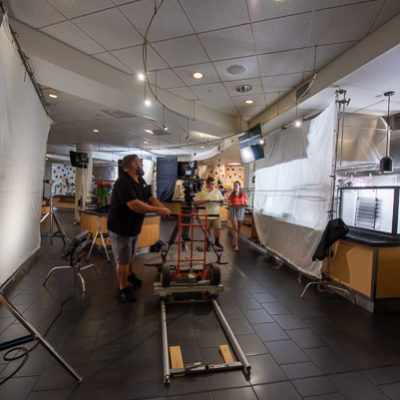 ... and truly roll on a dolly track as the cast and crew go "on location" in Capitol Eatery.