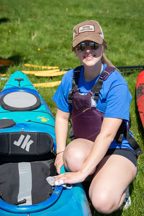 Smulligan, a Shenandoah resident, gets ready to take her kayak out on the lake.
