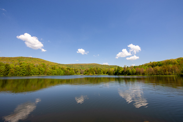 Reflecting blue skies and verdant foothills, Rose Valley Lake – typifying the outdoor treasures within a short driving distance of Penn College – beckons boaters.