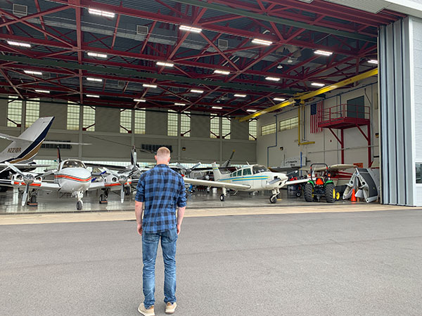 The Lumley Aviation Center's wide-open hangar doors offer a perfect vantage on the college's fleet of instructional aircraft.