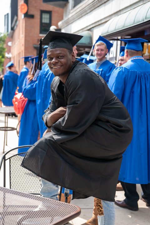 Austin D. Robertson patiently hangs out prior to the procession. On the other side of his wait? A degree in building automation engineering technology. (He also has an associate degree in heating, ventilation and air conditioning technology, earned in 2017).