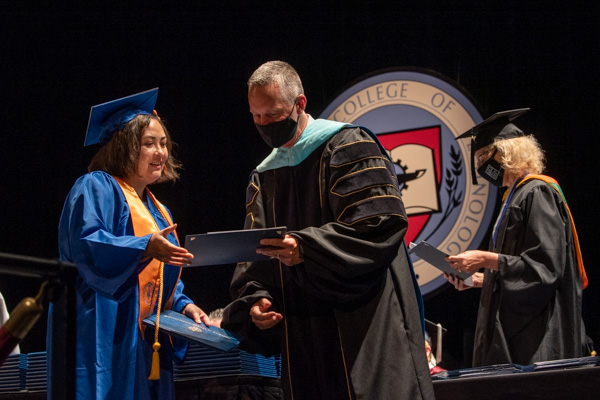 Facilitating the distribution of student honors are Michael J. Reed, vice president for academic affairs/provost, and Joanna K. Flynn, dean of curriculum and instruction. Accepting the Thelma S. Morris Award for "outstanding qualities of a practical nurse in the clinical area" is Tammy L. Subarton, of Montoursville.