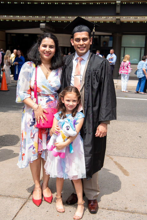 PA graduate Saurabh Shah, of Highland Park, N.J, with his wife and daughter ... and a well-wishing unicorn