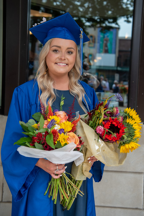 Taylor A. Steinbacher, of South Williamsport, doubles down on eye-popping bouquets in celebrating her associate degree in health arts: practical nursing emphasis.