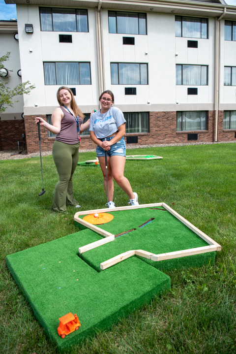 Mini-golfers Brooke Seana (left) and Courtney L. Petrilak, both of Waymart – classmates in high school and, now, in the School of Nursing & Health Sciences.